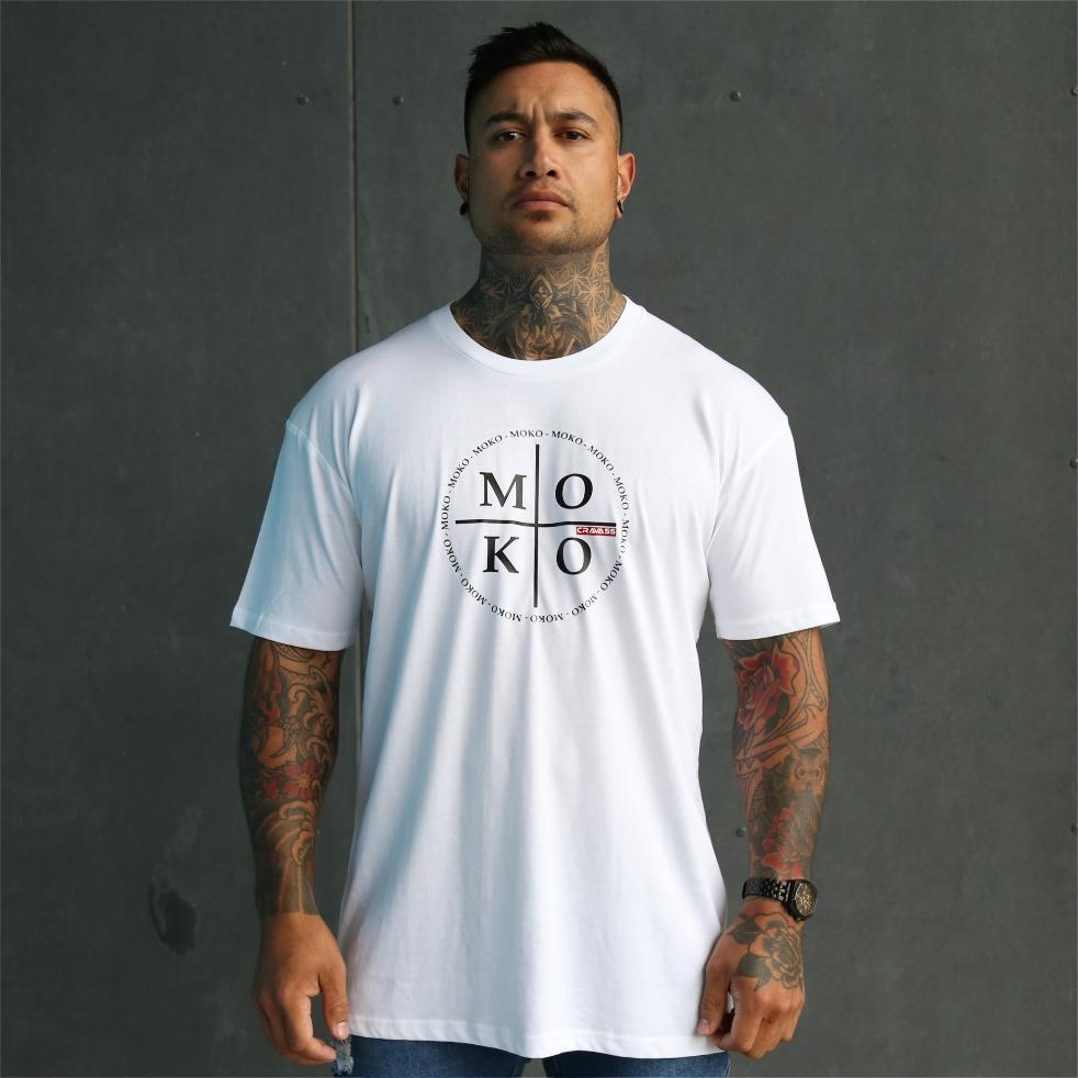 Mens white tshirt with round moko design on the front. Moko (maori tattoo). Front view