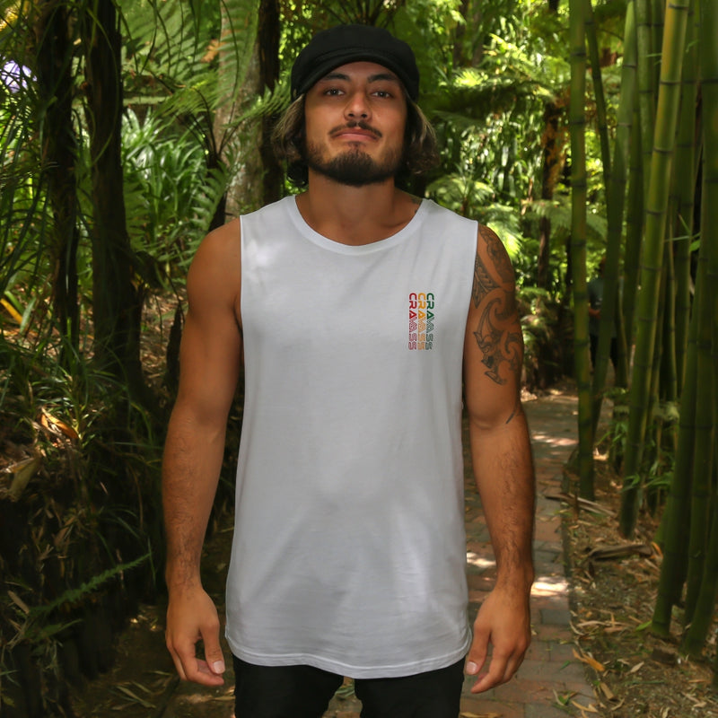 Men's white singlet with large Rasta coloured Maori design from Cravass clothing. Front view.