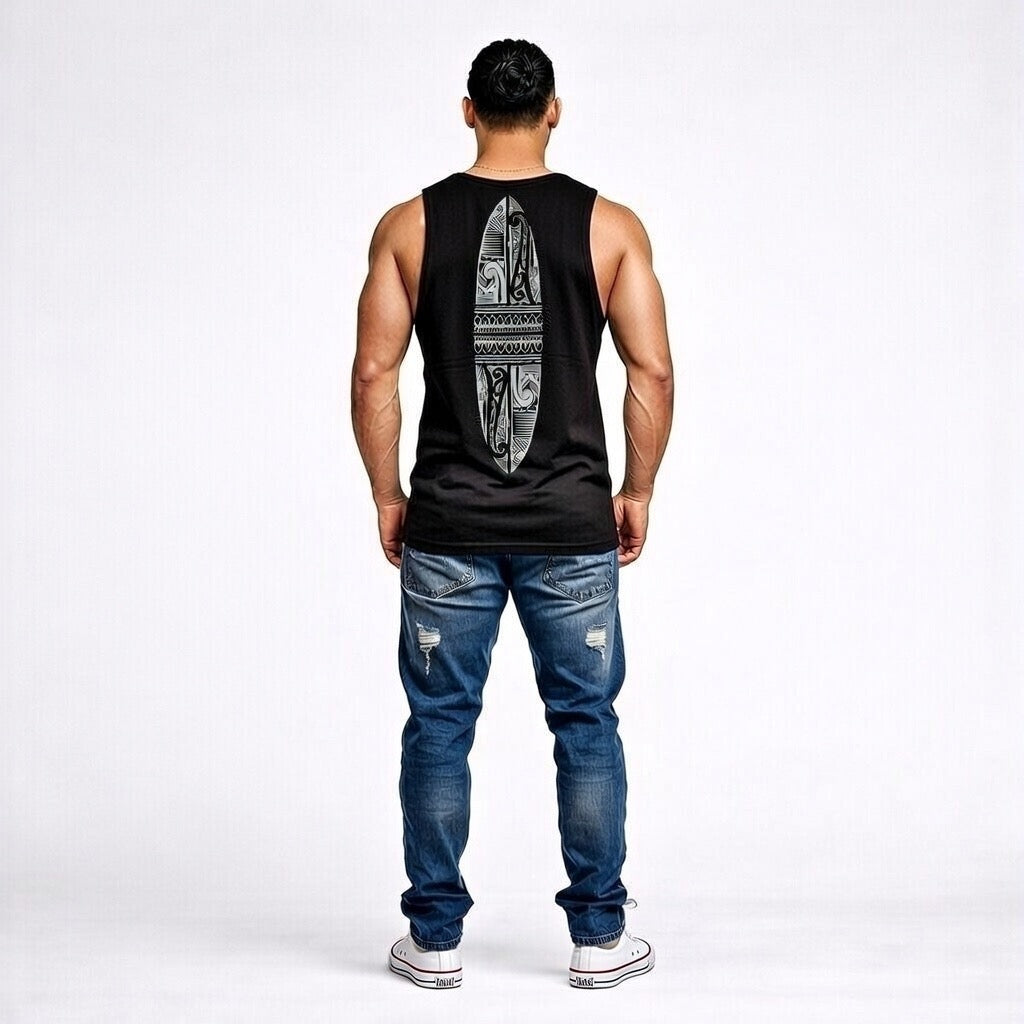 Man wearing a black tank top with Maori design on the back and blue jeans from Cravass.