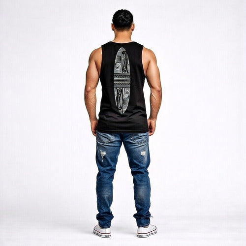Man wearing a black tank top with Maori design on the back and blue jeans from Cravass.