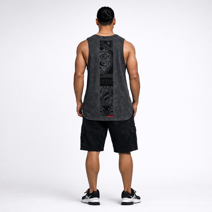 Man wearing a black singlet with Maori back design by Cravass. 