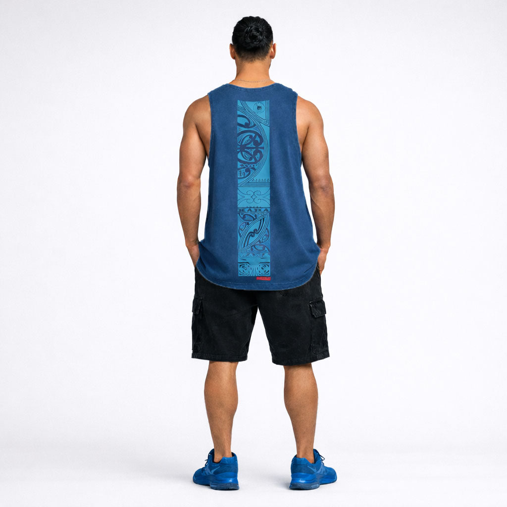 Man wearing a blue singlet with original Maori back design by Cravass. 