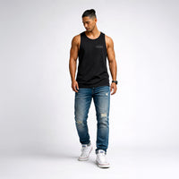 Man wearing a black tank top, blue jeans, and white sneakers Streetwear by Cravass 