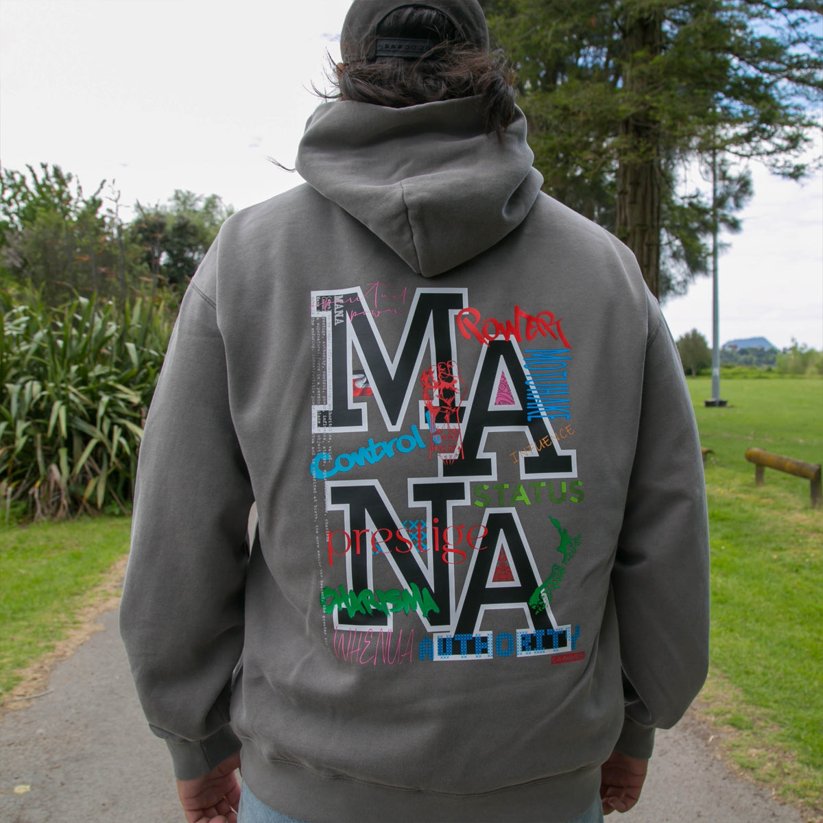 Men's faded grey hoodie with Maori art and design from cravass clothing. 