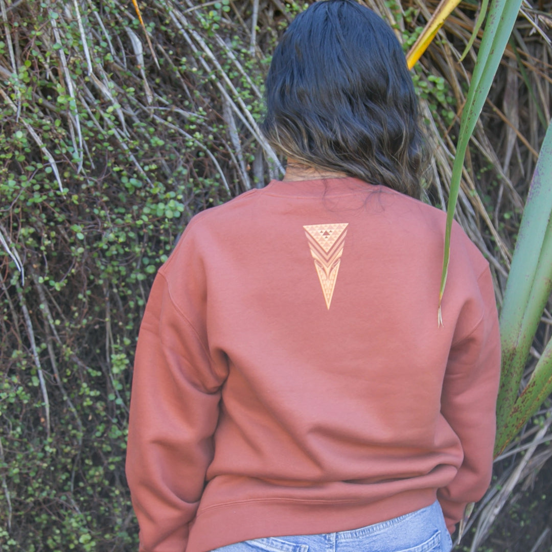 Women's jersey with brown contemporary Maori design.