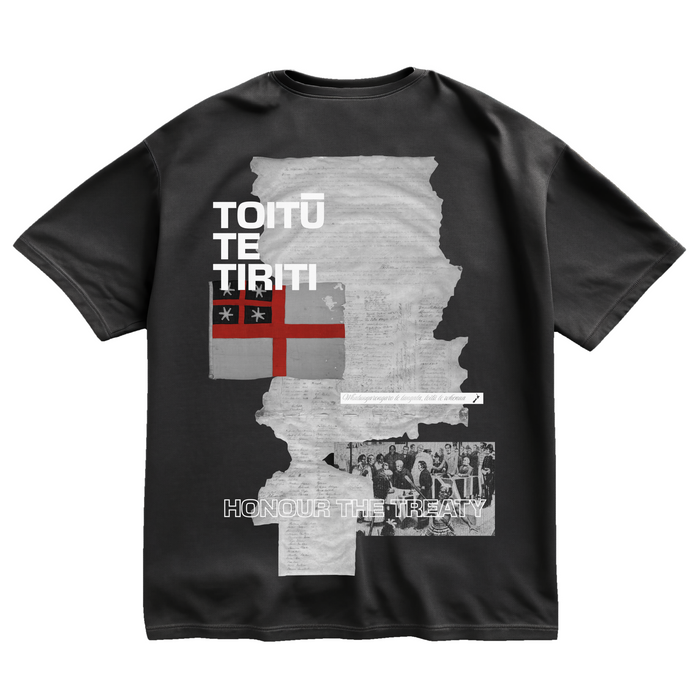 Black oversized cotton t-shirt with Toitū te Tiriti back design.