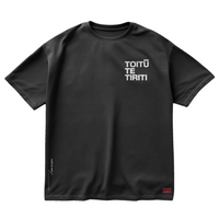 Black oversized cotton t-shirt with Toitū te Tiriti design on front chest.