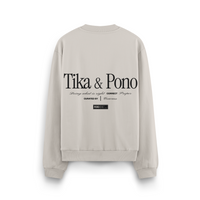 White unisex cotton crew with black Tika & Pono design logo on the back
