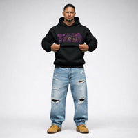 Cravass Waiporoporo black hoodie from Tiki Collection, bold purple Māori-inspired chest graphic, men’s streetwear studio photography