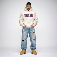 Cravass Waiporoporo Tiki hoodie in ecru colour, Māori streetwear pullover with purple graphic design, full body studio shot