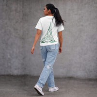 Lower Back Wha women’s white t-shirt with green Maori ta moko design NZ streetwear by Cravass