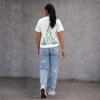 Back view of Lower Back Wha women’s white t-shirt with green Maori ta moko design NZ streetwear by Cravass