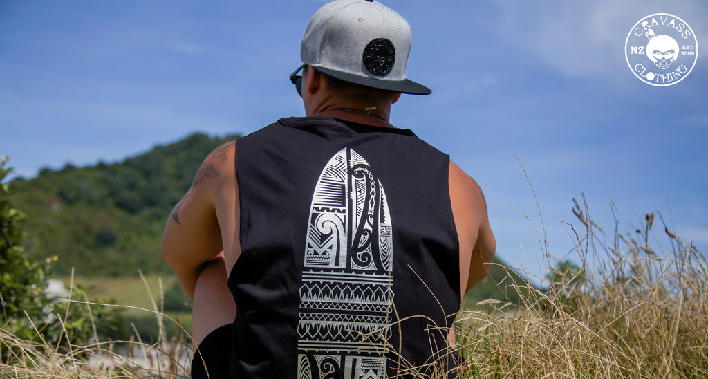 Mens black singlet with silver maori designed surfboard