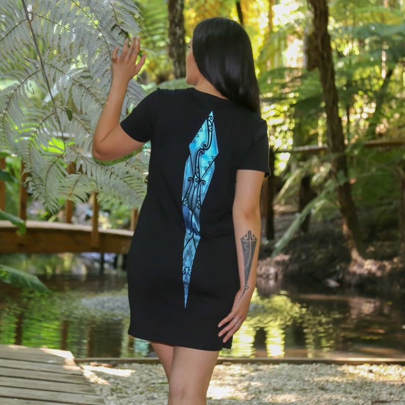 Women's black dress with stunning satin blue Maori design.