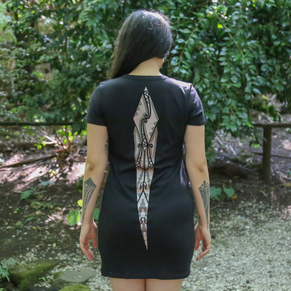 Women's black short sleeve dress with a mocha Maori design down the back. Maori clothing.