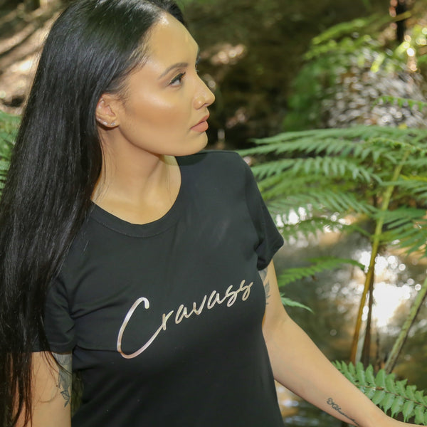 Front view of Cravass black women's dress with mocha logo.