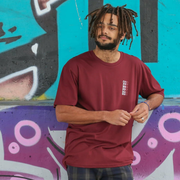 Model wearing Colour-Wha Burgundy streetwear tee