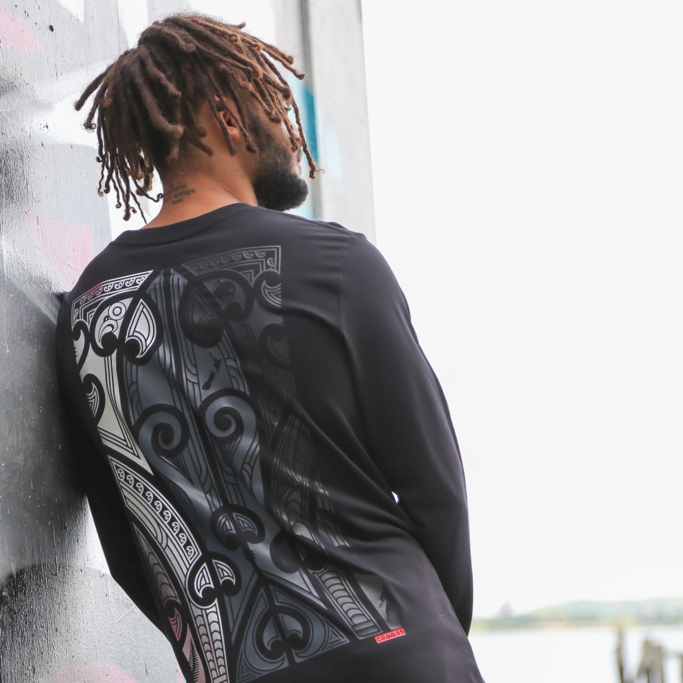 Black longsleeve t-shirt with silver, grey and black Maori design.