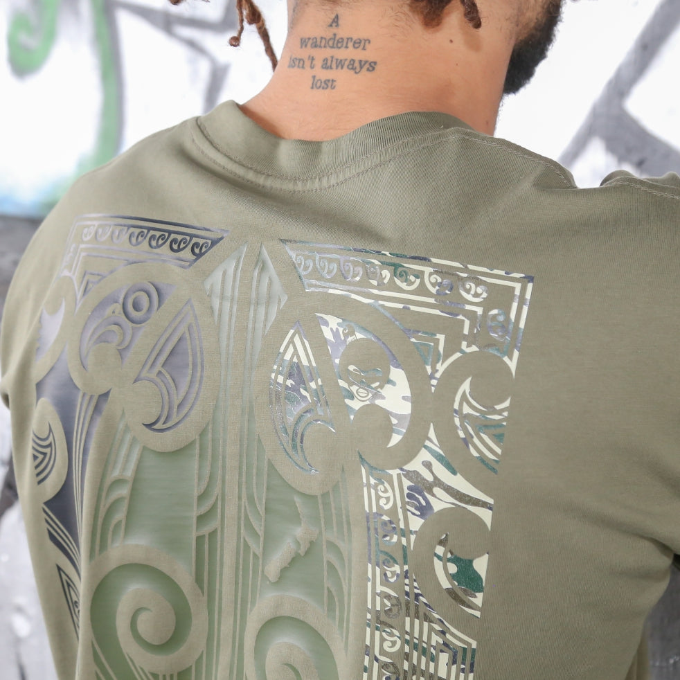 Close up of Men's army coloured t-shirt with black, army and camo Maori design.