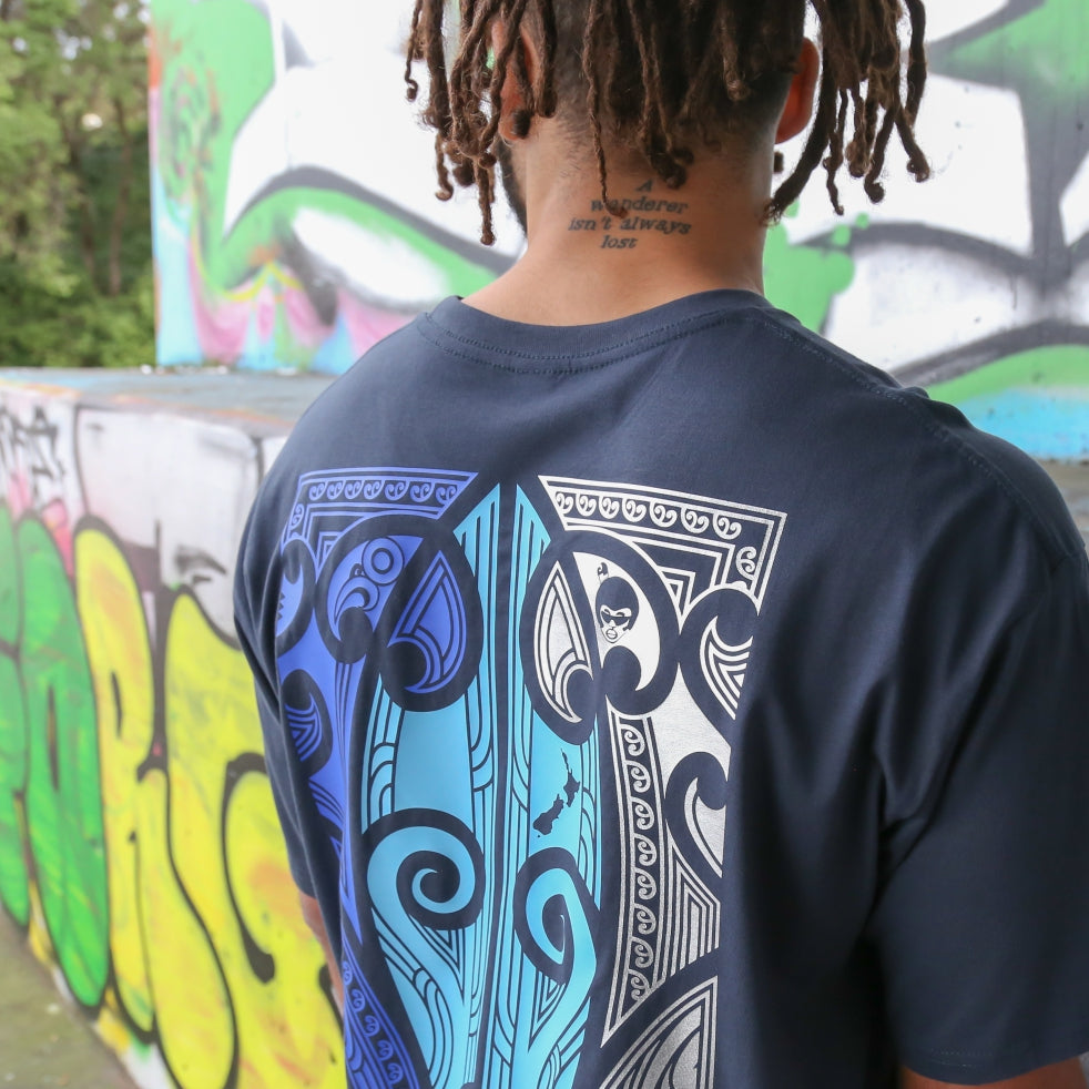 Men's blue coloured t-shirt with blue, light blue and silver Maori design.