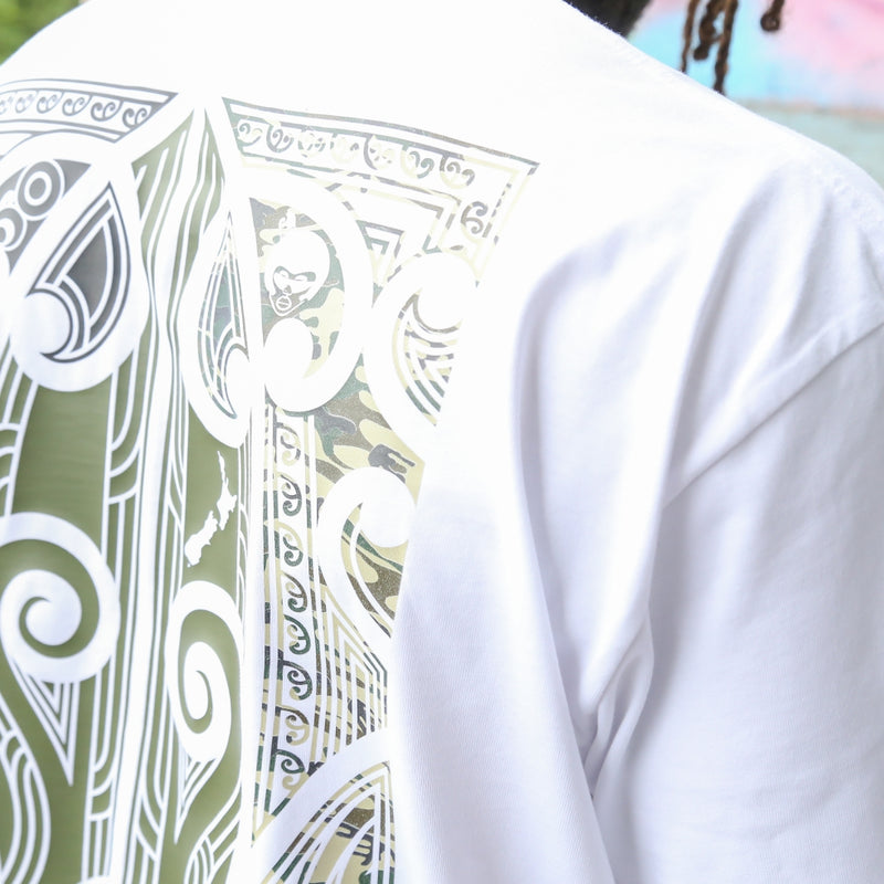 Men's white coloured t-shirt with black, army and camo Maori design.