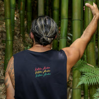 Model wearing black singlet with Rasta coloured Maori design from New Zealand clothing brand Cravass