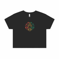 Women's black crop top with Maori design in Rasta colours
