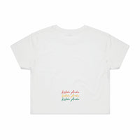 Women's white crop top with Maori design in Rasta colours back view.