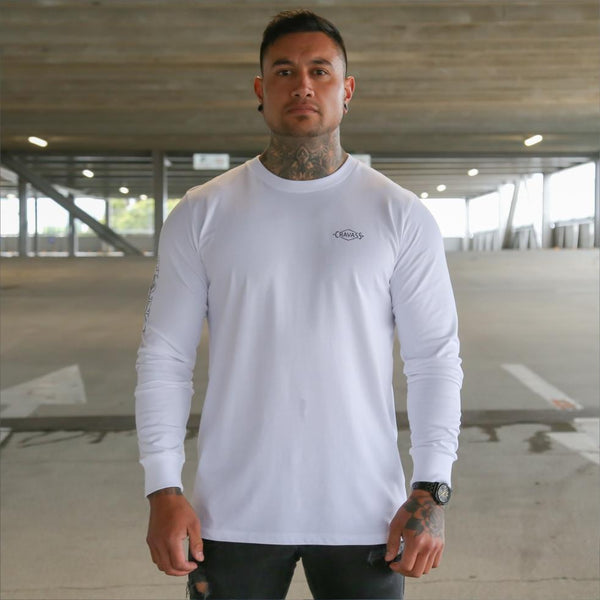 Mens white long sleeve tshirt with black Maori design. Meaning of Mana. Front view.