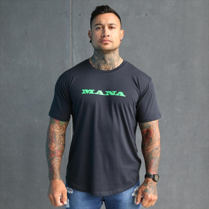 Mens navy tshirt with green maori design with the words Mana, Kaha and purotu incorporated. Front