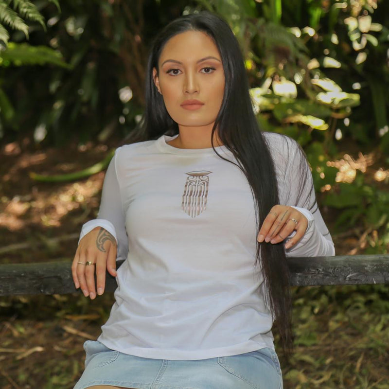 Women's white long sleeve t shirt with mocha Maori Moko Kauae design from Cravass Clothing. Maori Clothing.
