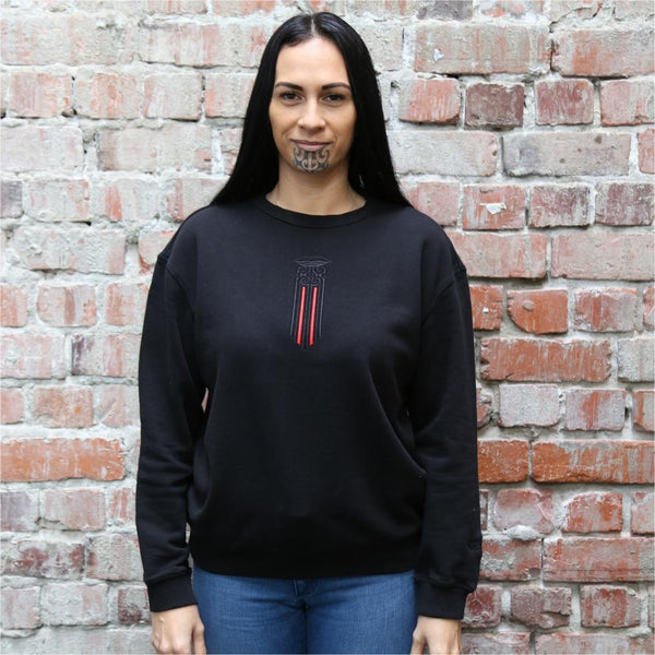 Women's black crew jersey with a black and red Maori moko kauae design.