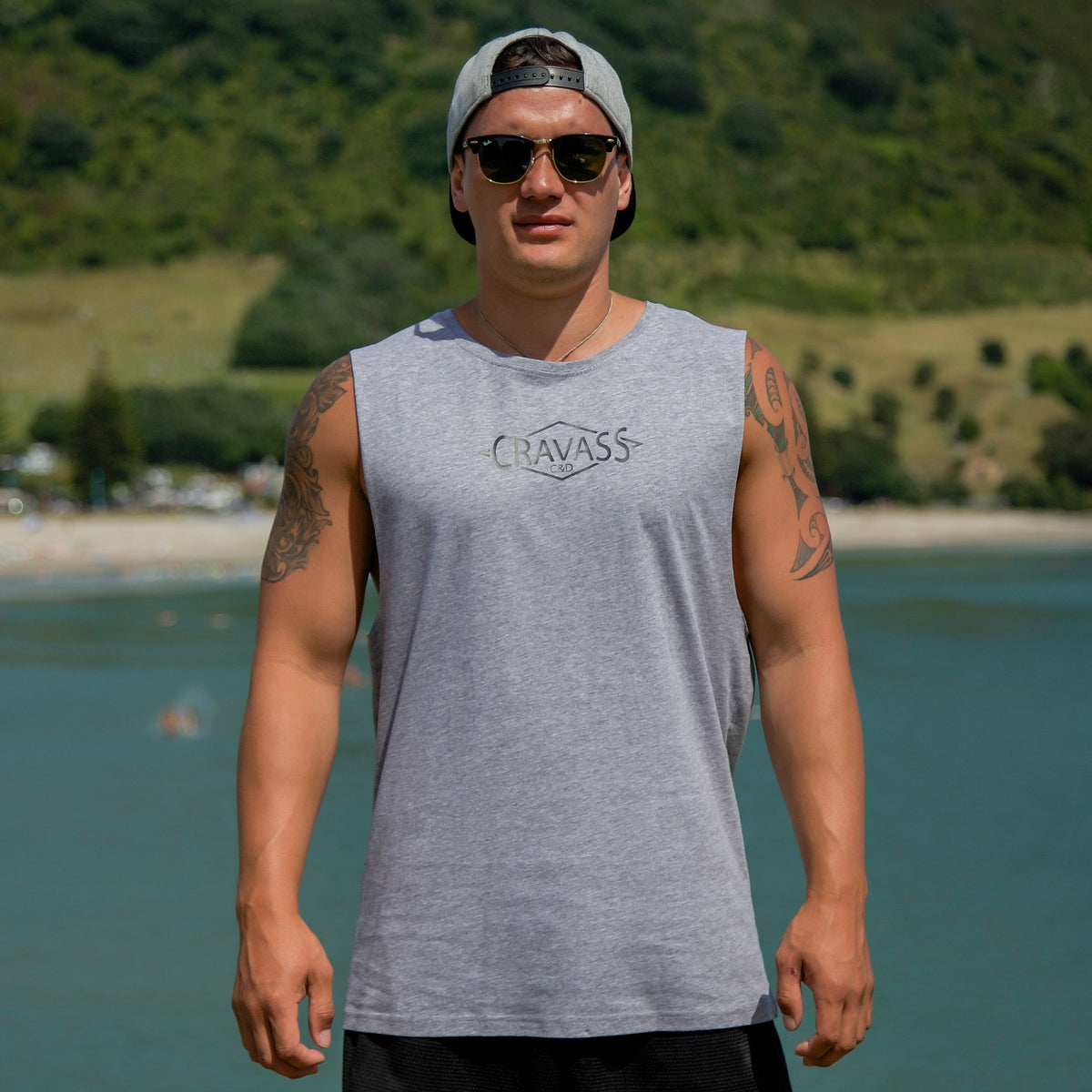 Cravass grey tank top with black Polynesian Maori design down the back. 