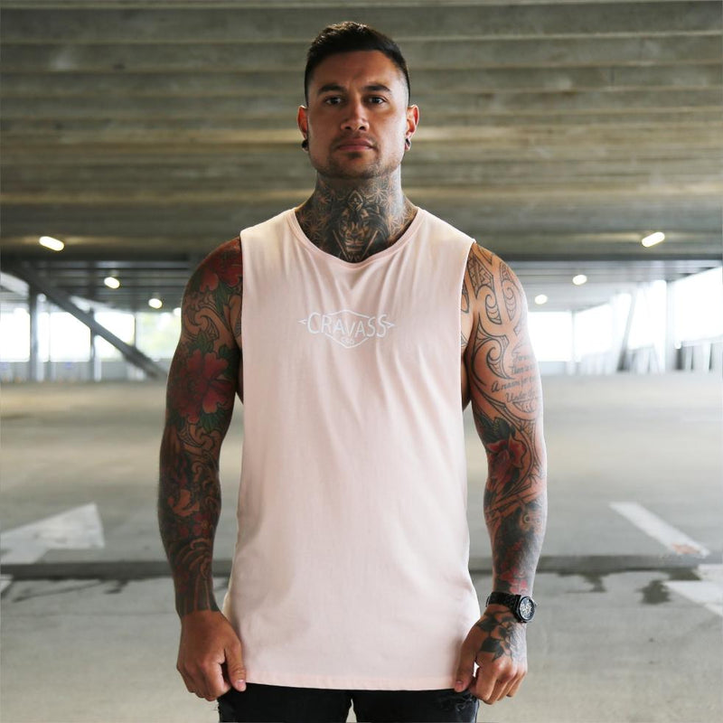 Pink unisex singlet with white maori designed surfboard. Maori clothing. Front view