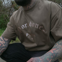 Men's brown heavyweight T-shirt with satin Pork bones and Puha design.