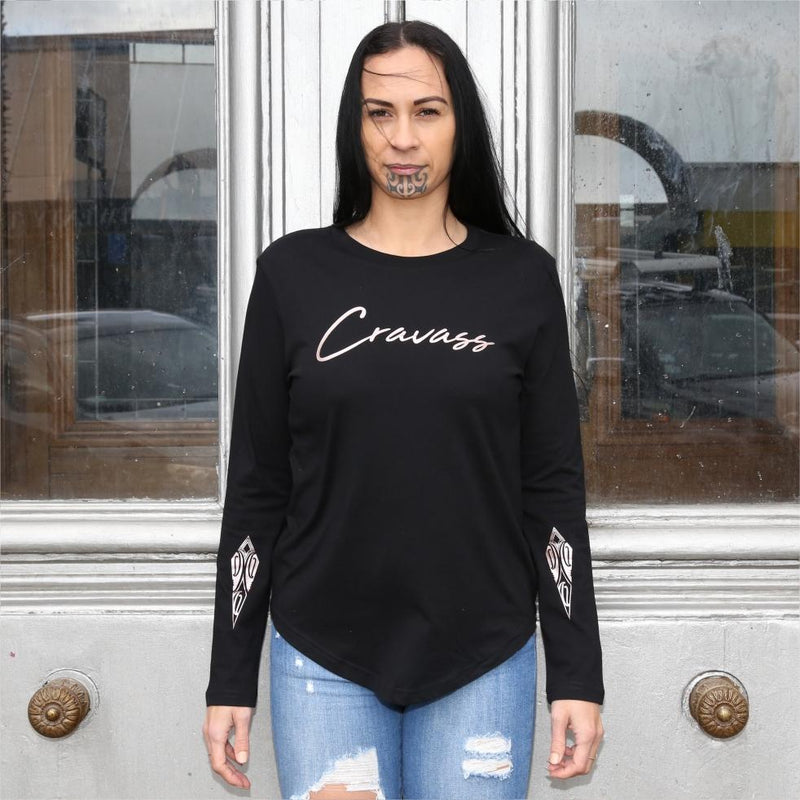 Women's black long sleeve tshirt with Maori design and art on the forearm.