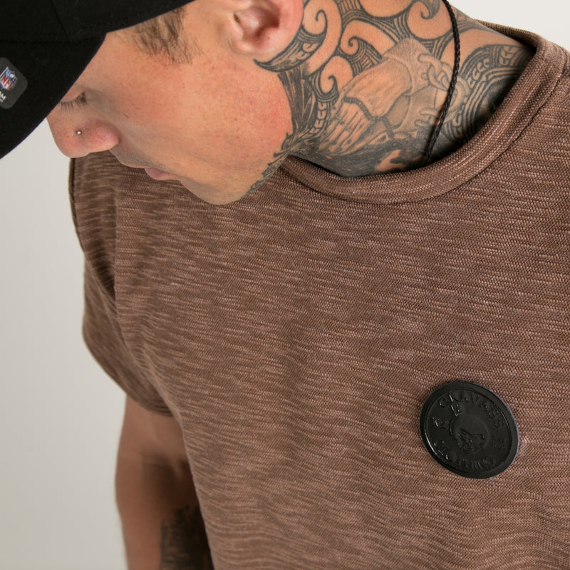Brown textured men's tops with leather patched logo from Cravass Clothing.