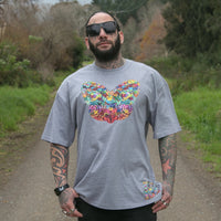 Men's grey heavyweight t-shirt with colourful Maori tiki design from Cravass clothing.